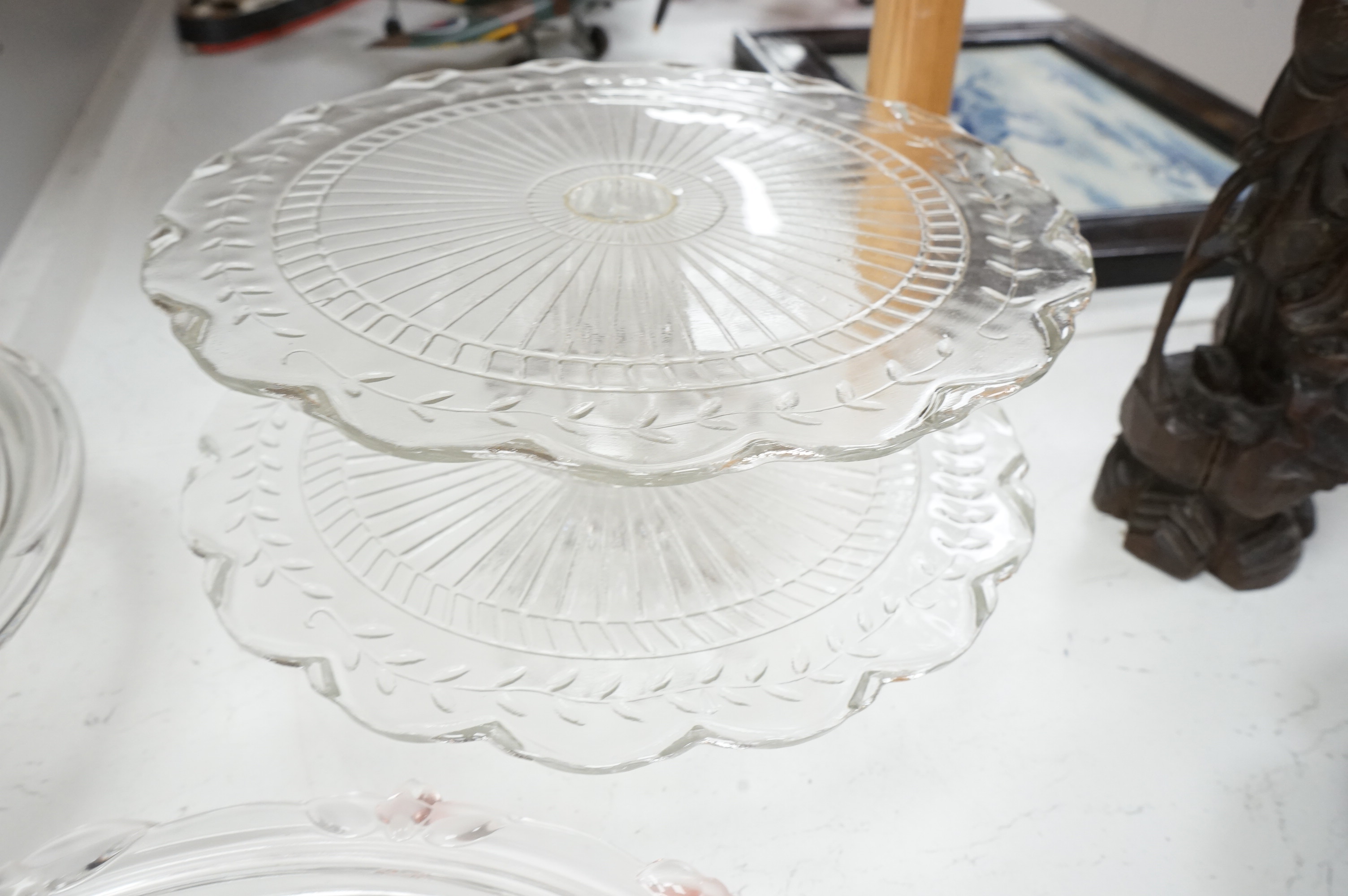 Seven decorative 20th century glass cake tazza, largest 36cm diameter